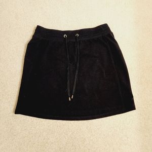 Small plain black skirt by Green Tea